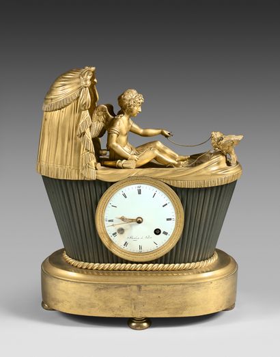 Chased bronze clock, patinated and gilded...