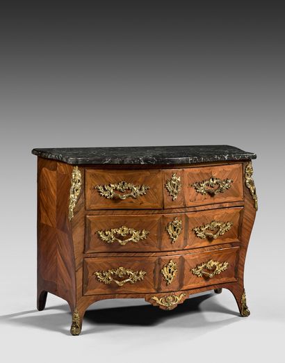 null Chest of drawers inlaid with rosewood leaves in frames of the same species,...