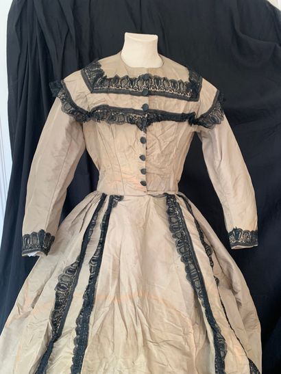 Afternoon dress, circa 1865-1866. 
Olive...