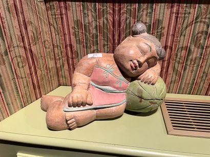 null Two children in polychrome wood sleeping on watermelons. 
Work in the Asian...