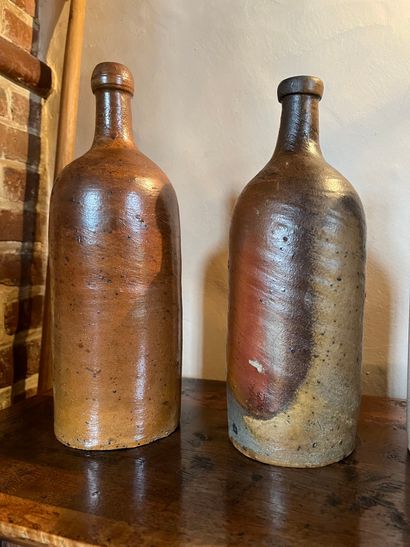 null Lot of five bottles and a stoneware vase
Chips
H : 40 cm


COLLECTION by APPOINTMENT...