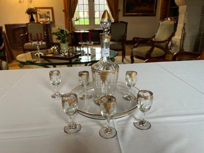 null Liqueur service including a carafe and six glasses with enamelled decoration...