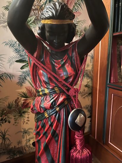 null Nubian woman, polychrome plaster, red and black dress (chips)
Height 200 cm
Electrified


COLLECTION...