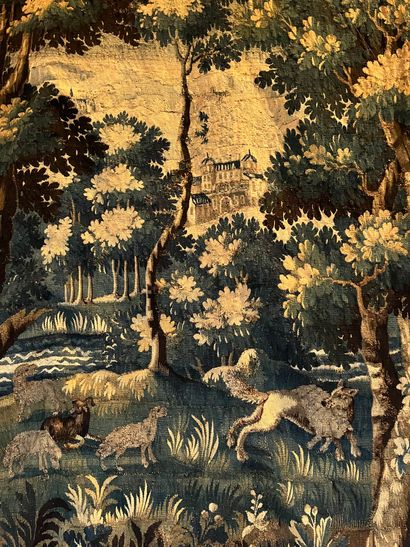 null Tapisserie d’Aubusson en laine et soie, verdure animée d’un renard et de moutons....