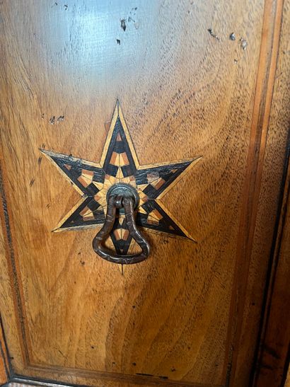 null Piece of furniture with two bodies in fruitwood inlaid with stars. 
The recessed...