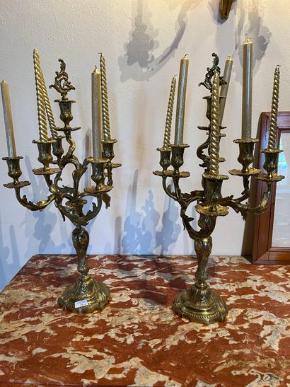null Pair of bronze candelabras, with seven curved arms of light,
with acanthus decoration....
