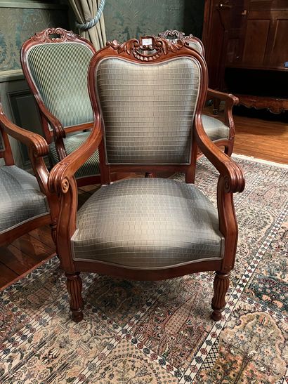 null Pair of molded and carved mahogany armchairs, openwork top of the back, godronned...