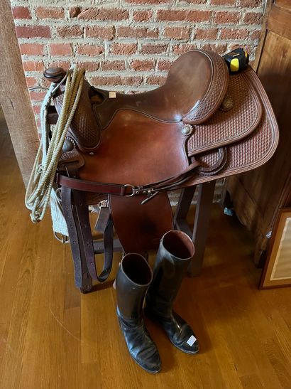 Brown leather saddle, with stirrups, signed...