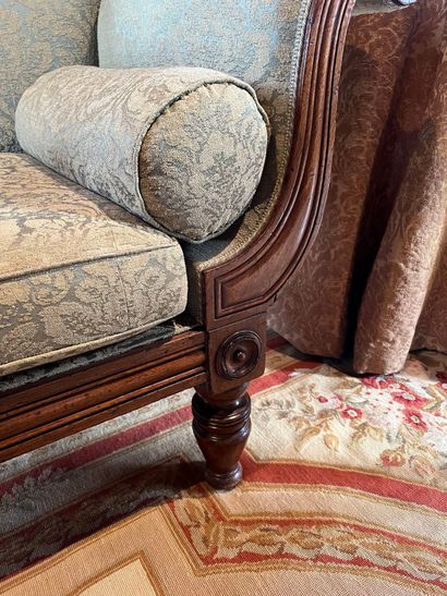 null Sofa with curved back in stained wood and carved with gadroons, armrests with...