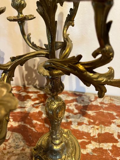 null Pair of bronze candelabras, with seven curved arms of light,
with acanthus decoration....