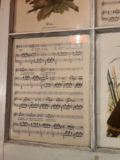 null Lot including:
 a framed piece birds and music scores, polychrome wood panel...