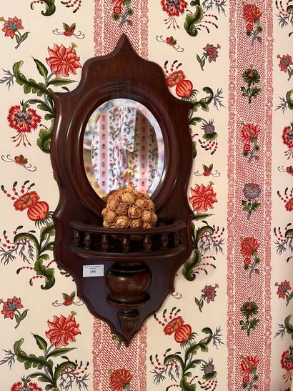 null Small mirror with stained wood frame and 
baluster columns.
H : 65 cm


REMOVAL...