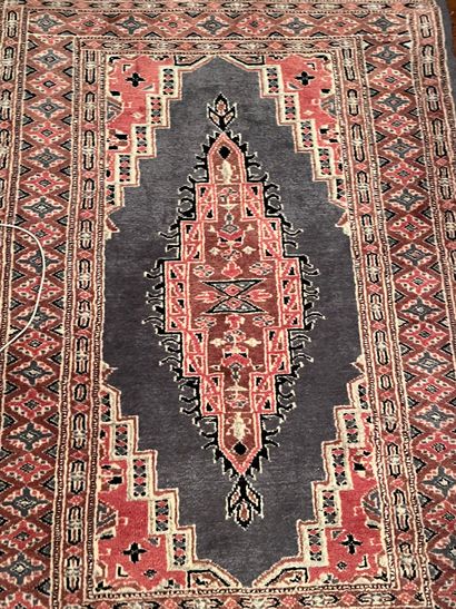 Woolen carpet, geometrical patterns, in the...