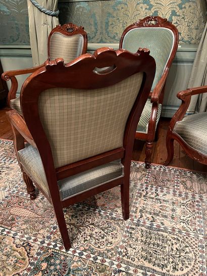 null Pair of molded and carved mahogany armchairs, openwork top of the back, godronned...