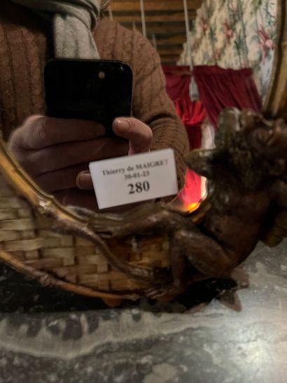 null Lot of trinkets: mirror decorated with a monkey. 
Pair of candlesticks monkey...