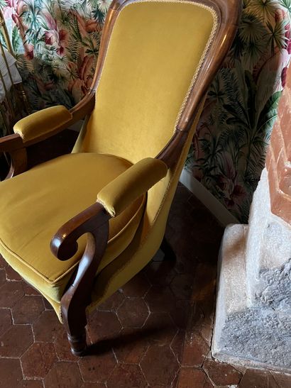 null Armchair " Voltaire " in stained wood, upholstered in mustard velvet. 
H: 88...