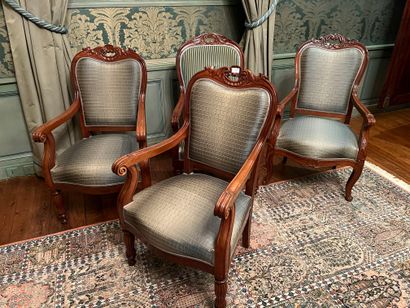 Pair of molded and carved mahogany armchairs,...