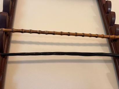 null Set of two whips, one in bamboo wood with silver plated handle and the other...