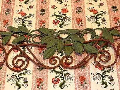 null Wrought iron element lacquered green and pink, interlacing and foliage.
About...