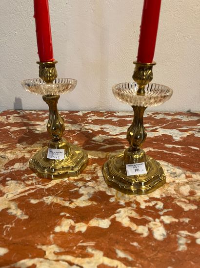 Pair of candlesticks in bronze, chased with...