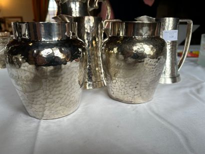 null Lot of hammered silver metal including four pots and two pots, some of which...