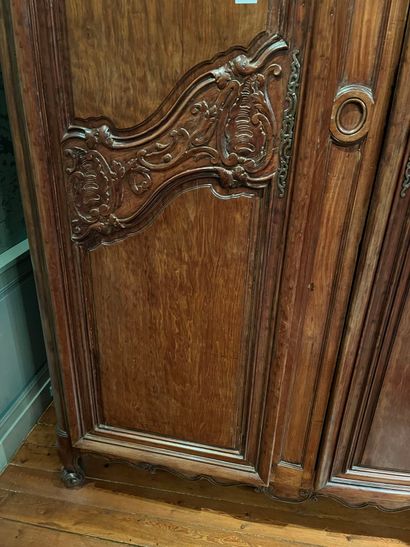 null Mahogany cabinet called "de port" molded and carved with rocaille 
and foliated...