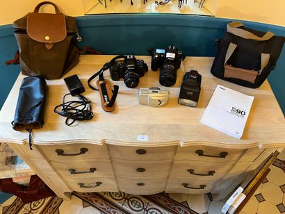 null Lot including a Nikon F-801S camera, another Nikon D90 with two Nikon lenses,...