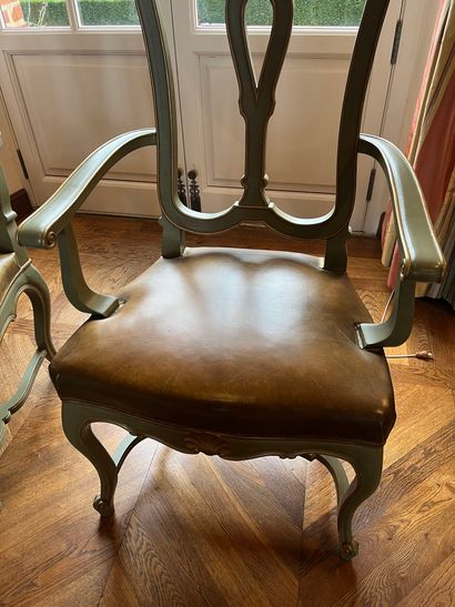 null Suite of twelve chairs and two armchairs in green lacquered wood and gilded...
