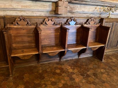 Suite of three church stalls in walnut with...