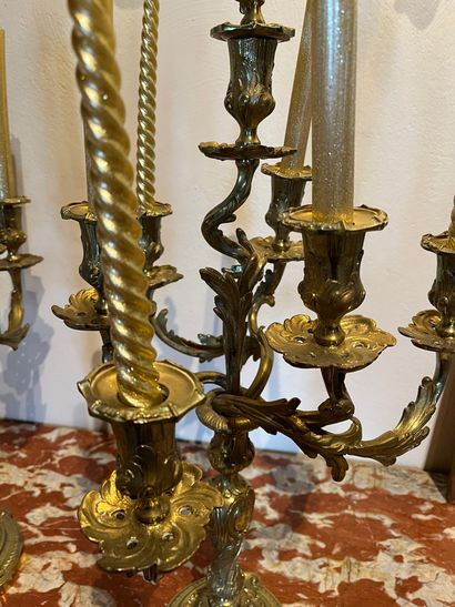 null Pair of bronze candelabras, with seven curved arms of light,
with acanthus decoration....