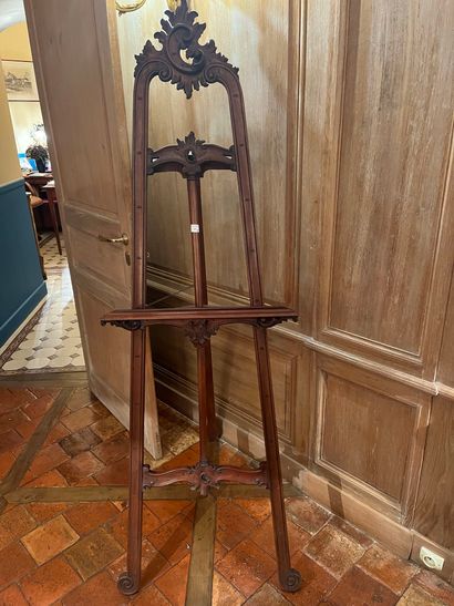 Easel in stained wood carved with rocaille...