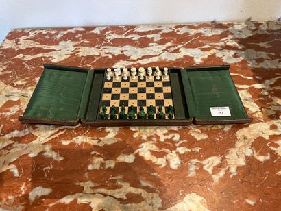 Travel chess set, in a green leather case...