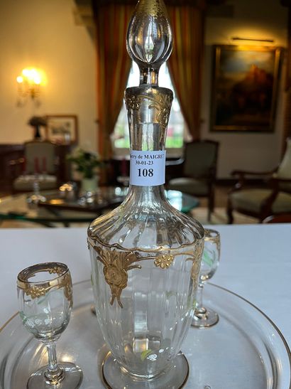 null Liqueur service including a carafe and six glasses with enamelled decoration...