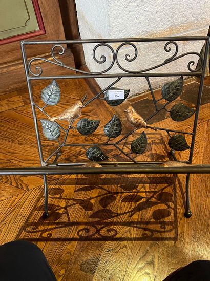 null Wrought iron magazine rack decorated with branching birds, green lacquered and...
