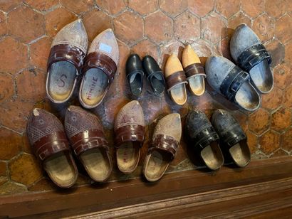 Lot of various wooden and leather clogs (in...
