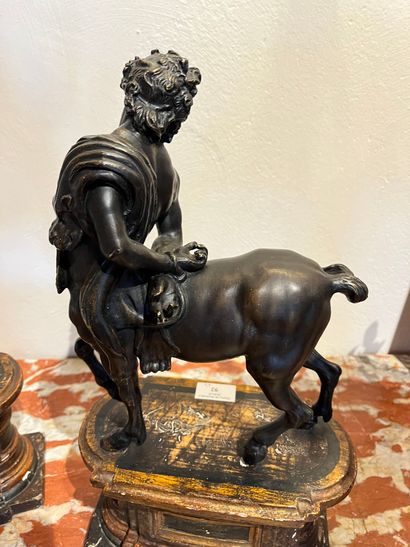 null Pair of centaurs said of FURIETI, bronze with dark patina, on oblong patinated...