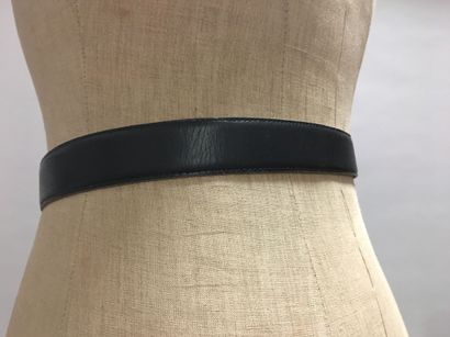 null CHANEL: Set of 2 black leather belts, one of which has a chain yoke with a logo....