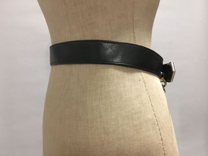 null CHANEL: Set of 2 black leather belts, one of which has a chain yoke with a logo....