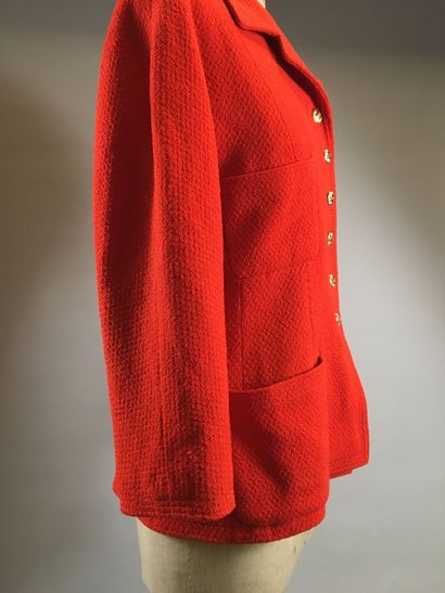 null CHANEL: Orange wool suit, small collar, single breasted, long raglan sleeves,...