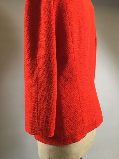 null CHANEL: Orange wool suit, small collar, single breasted, long raglan sleeves,...