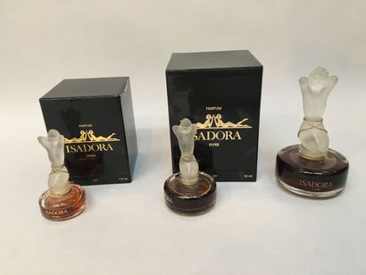 null Isadora - (1976)
Assortiment de trois flacons en verre incolore et dépoli pressé...