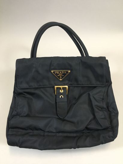 null PRADA: Double sided bag in navy blue nylon, handle, front embellished with the...