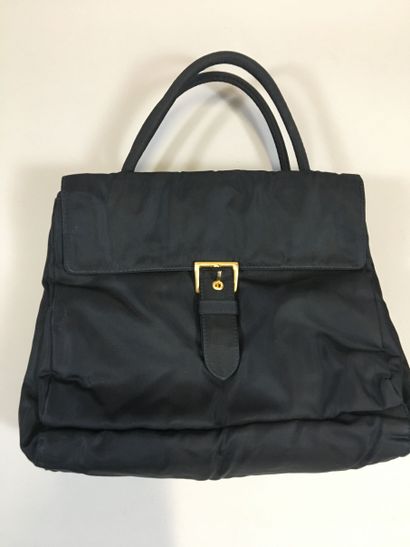 null PRADA: Double sided bag in navy blue nylon, handle, front embellished with the...