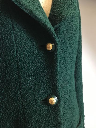 null CHANEL Boutique Fall-Winter 1993: Fir green wool suit including a jacket with...