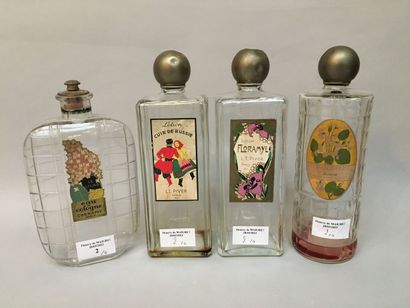 null Various Perfumers - (1930's)
Assortment of four colorless pressed glass bottles...