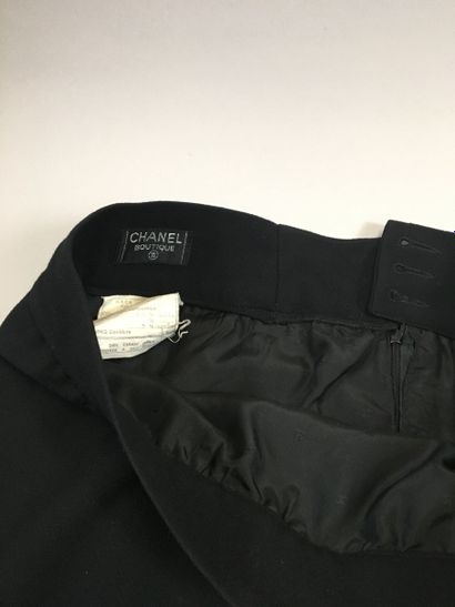 null CHANEL, HERMES SPORT: Set including a black woolen skirt with buttoned front...