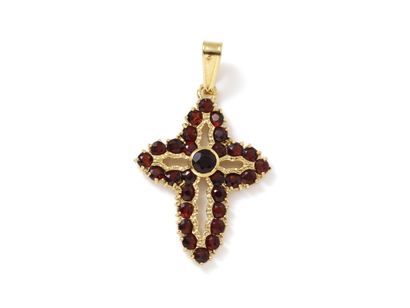 null Pendant in 750 thousandths gold, holding a delicately openwork cross set with...