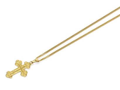 null Pendant in 750 thousandths gold featuring a chased Orthodox cross in a poly-lobed...