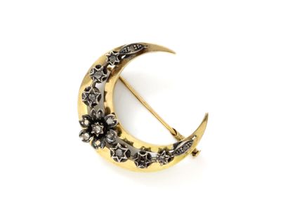 null Gold 750 and silver 800 thousandths brooch, stylizing a crescent moon applied...