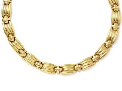 null Necklace in 750 thousandths gold with gadrooned links. Features an invisible...